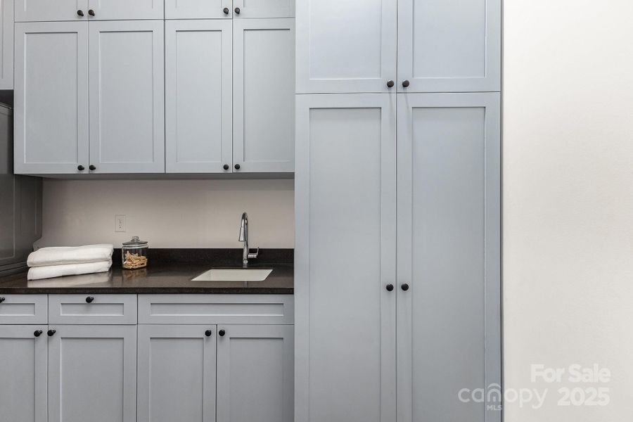 Storage for basic home appliances is efficient in the custom cabinetry Storage for basic home appliances is efficient in the custom cabinetry
