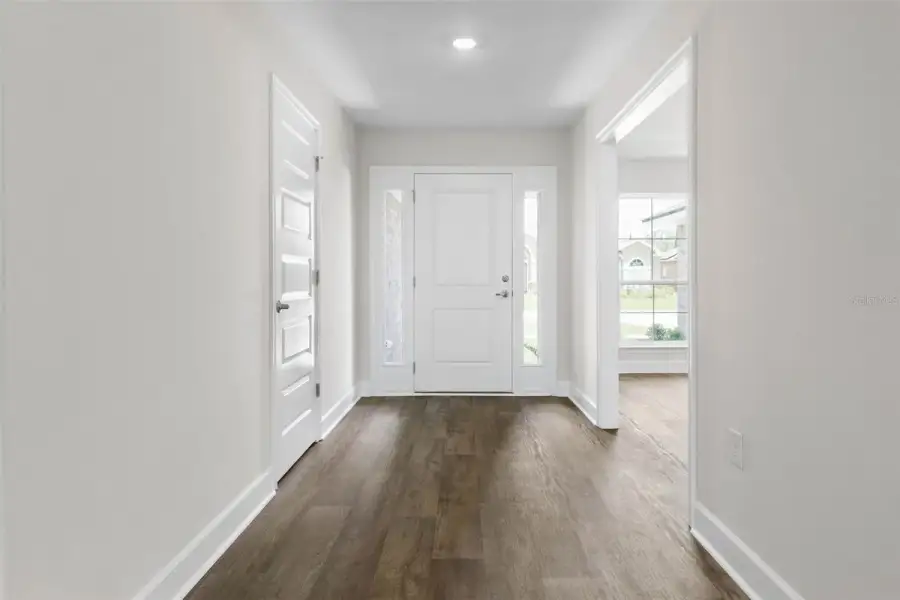 Representative unfurnished interior of a home built from the 2117 by Adams Homes in Flagler Estates, Hastings (Image 13).