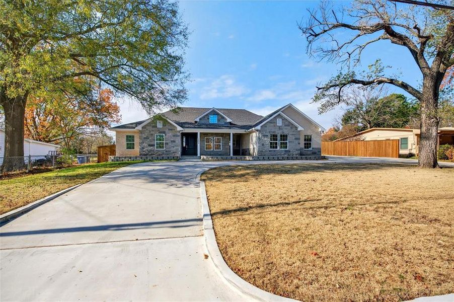 Front exterior of a new home in , Denison, TX, highlighting curb appeal (Image 2). Front exterior of a new home in , Denison, TX, highlighting curb appeal (Image 2).