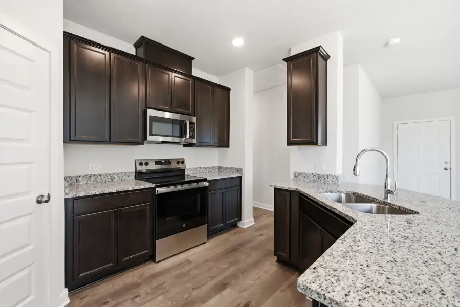 Furnished interior view inside a new home in The Cottages at Pagosa Springs, Bryan (Image 4).