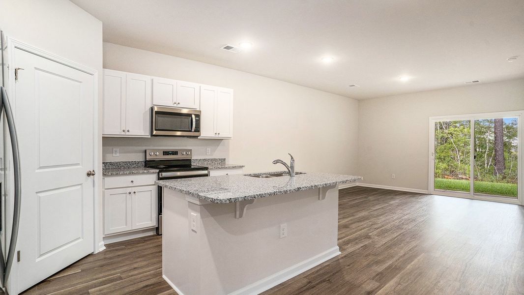 Furnished interior view inside a new home in Rich Square at Brunswick Plantation, Ash (Image 5). Furnished interior view inside a new home in Rich Square at Brunswick Plantation, Ash (Image 5).