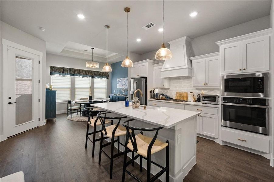 Notice the gorgeous light fixtures