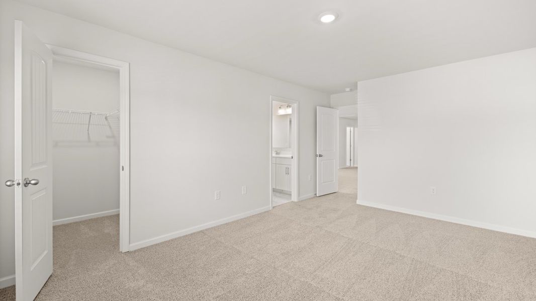 Representative unfurnished interior of a home built from the Westerly by D.R. Horton in Haven Abbey, Cumming (Image 28).