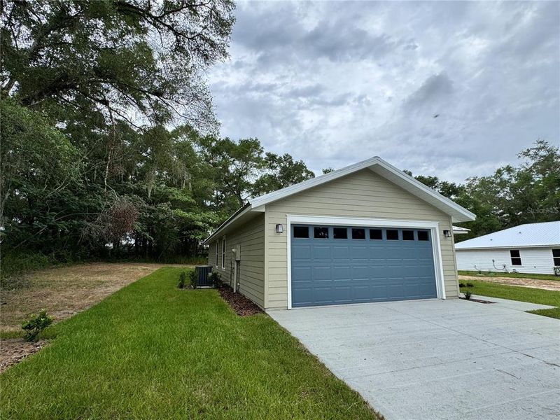 Front exterior of a new home in , Trenton, FL, highlighting curb appeal (Image 2). Front exterior of a new home in , Trenton, FL, highlighting curb appeal (Image 2).