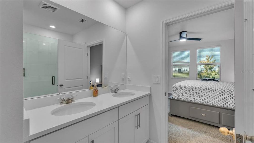 Furnished interior view inside a new home in The Grove at Stuart Crossing - Premier Series, Bartow (Image 6).