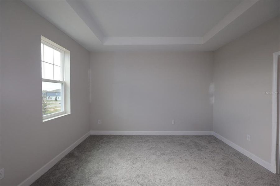 Spacious, unfurnished interior of a new home in Lake Star at Ovation, Winter Garden (Image 9).