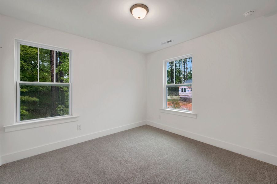 Spacious, unfurnished interior of a new home in Ashmore Townes, Garner (Image 26). Spacious, unfurnished interior of a new home in Ashmore Townes, Garner (Image 26).