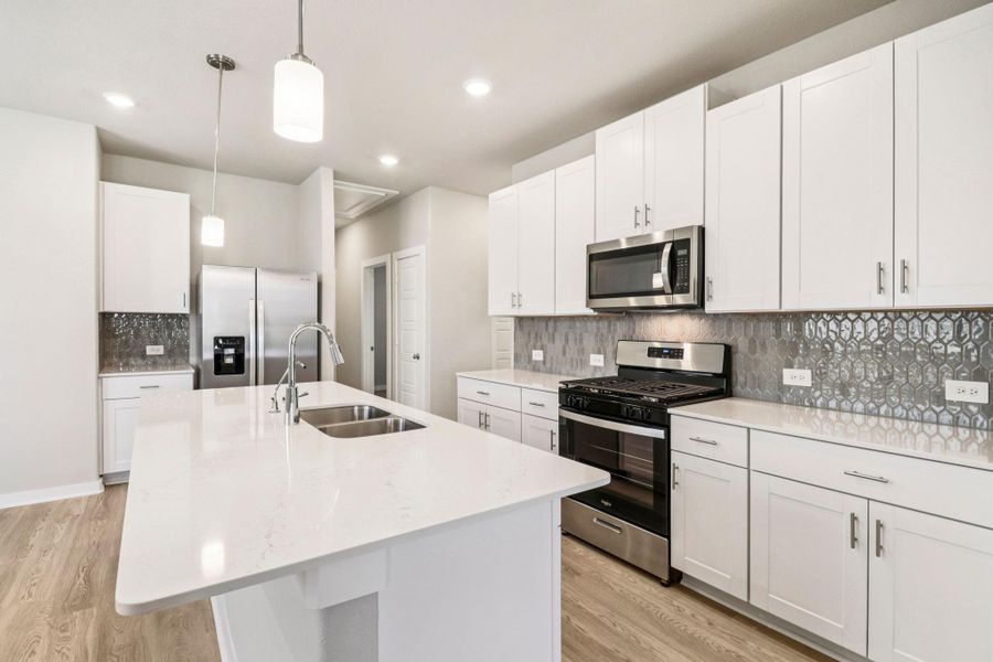 Photo is not of the actual home, but is an inspirational photo of builder’s model home and may depict options, furnishings, and/or decorator features that are not included