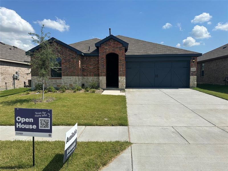 Front exterior of a new home in Cartwright Ranch, Crandall, TX, highlighting curb appeal (Image 2). Front exterior of a new home in Cartwright Ranch, Crandall, TX, highlighting curb appeal (Image 2).