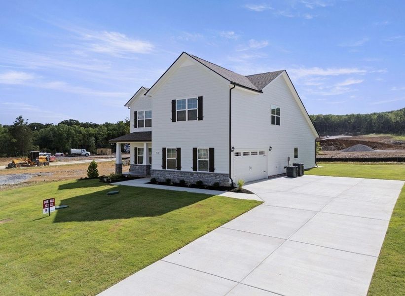 Front exterior of a new home in Brewer Point, Murfreesboro, TN, highlighting curb appeal (Image 20).