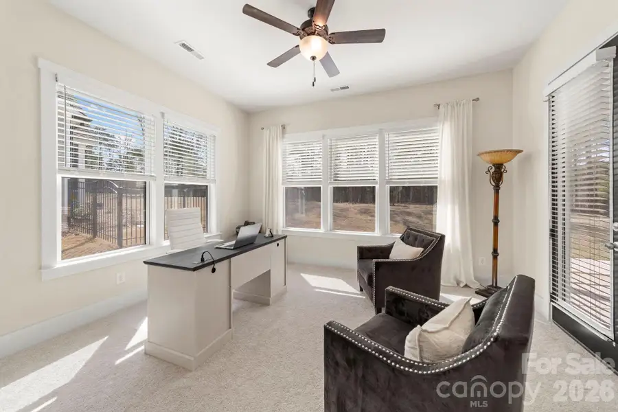 Sitting Room with plenty of light and exit to covered porch