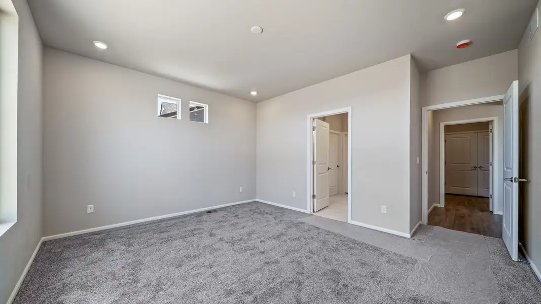 Spacious, unfurnished interior of a new home in The Reserve at Green Valley Ranch, Aurora (Image 22).