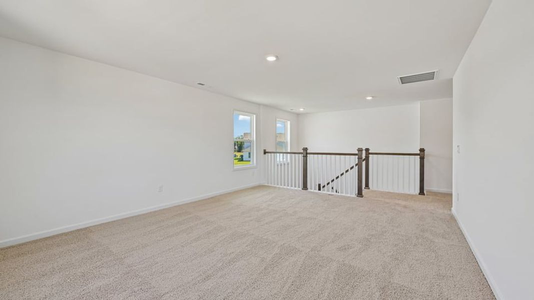 Spacious, unfurnished interior of a new home in Eagle Creek, Fuquay Varina (Image 24).