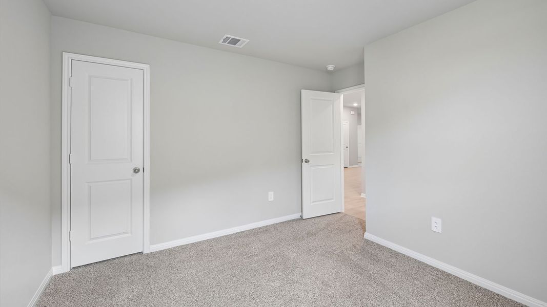 Spacious, unfurnished interior of a new home in Carillon, Manor (Image 29).