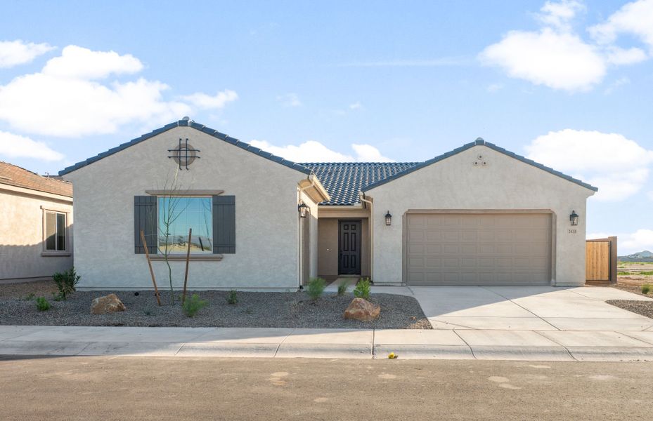 Front exterior of a new home in Soleo, San Tan Valley, AZ, highlighting curb appeal (Image 24).