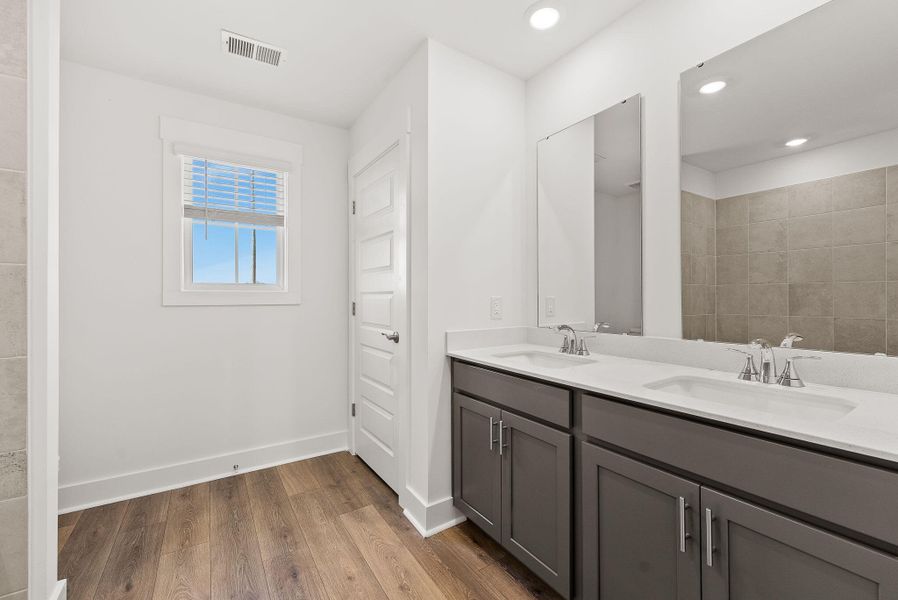 Furnished interior view inside a new home in The Coves at Lakes of Cane Bay, Summerville (Image 20). Furnished interior view inside a new home in The Coves at Lakes of Cane Bay, Summerville (Image 20).