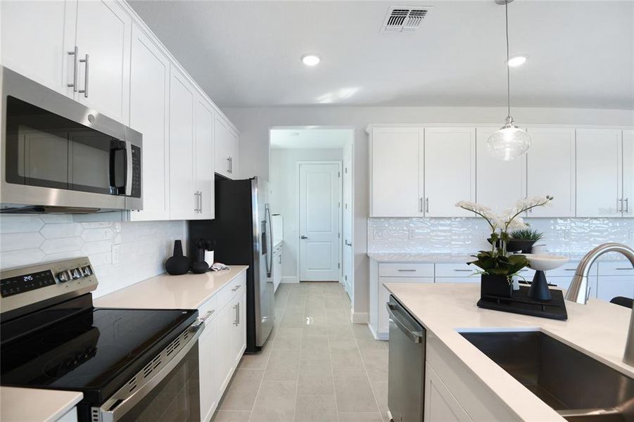 Furnished interior view inside a new home in Seaport Village, Tavares (Image 25). Furnished interior view inside a new home in Seaport Village, Tavares (Image 25).