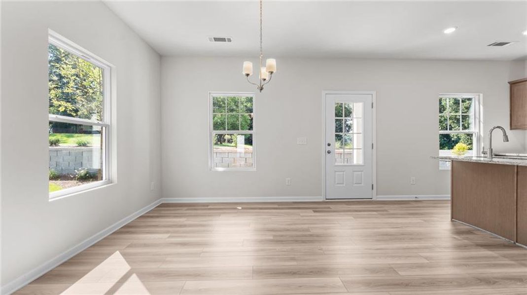 Spacious, unfurnished interior of a new home in Magnolia Trace, Flowery Branch (Image 12).