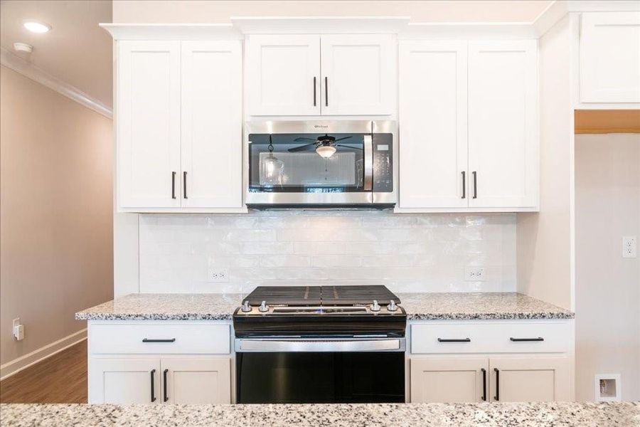 Furnished interior view inside a new home in Wilkins Walk, Mableton (Image 5).