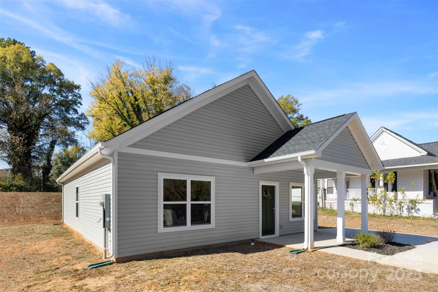 Front exterior of a new home in , Spencer, NC, highlighting curb appeal (Image 20).