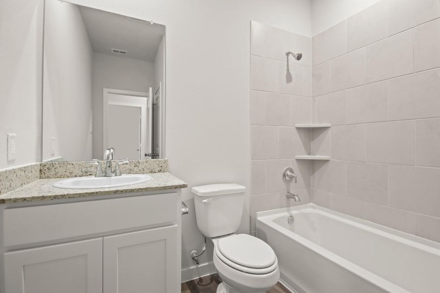 Furnished interior view inside a new home in Sherwood Glen, Conroe (Image 6).