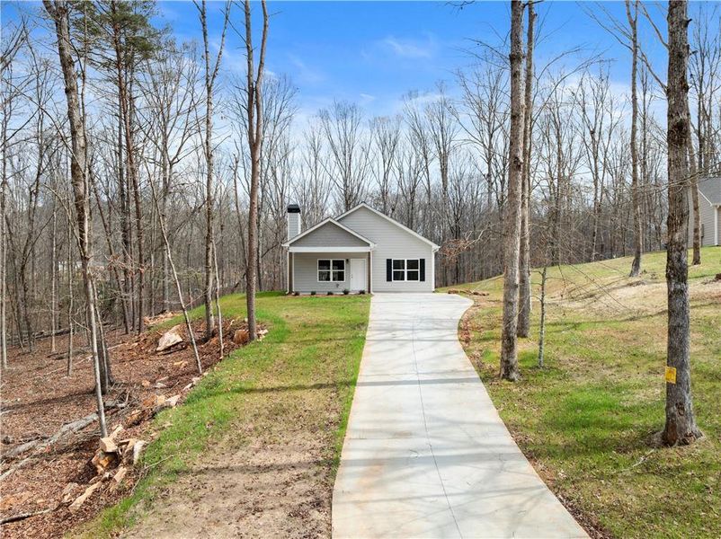 Front exterior of a new home in , Cleveland, GA, highlighting curb appeal (Image 19). Front exterior of a new home in , Cleveland, GA, highlighting curb appeal (Image 19).