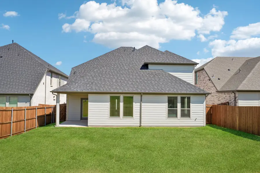 Covered Patio in the Wimbledon home plan by Trophy Signature Homes
