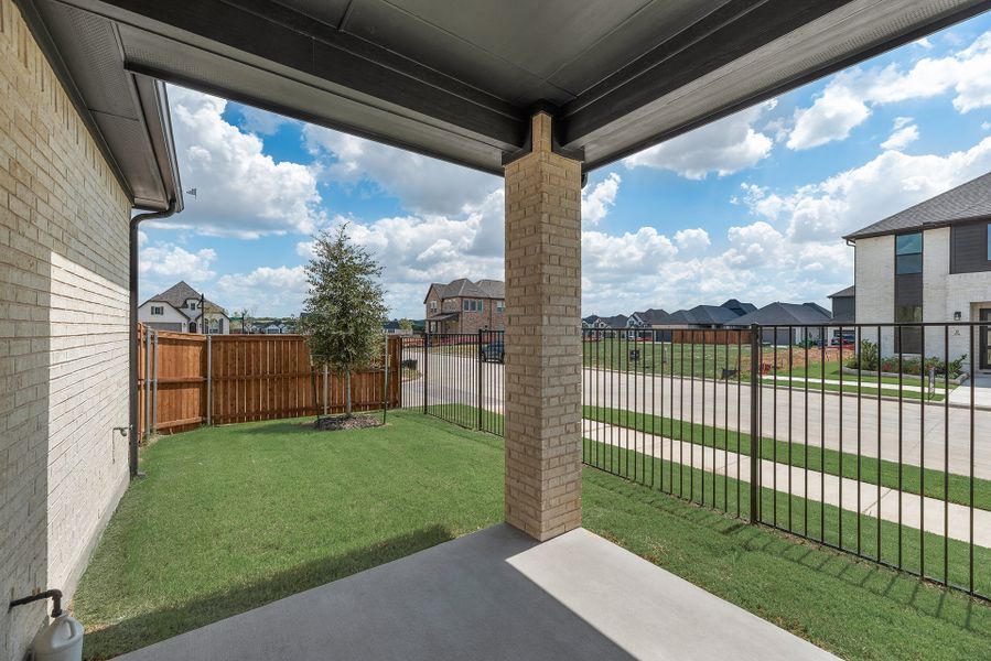 Exterior details and patio area of a home in Cottages of Celina, Celina (Image 3).