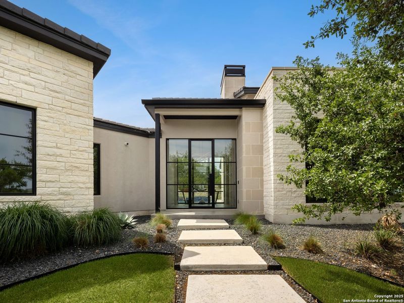Front exterior of a new home in , Boerne, TX, highlighting curb appeal (Image 22).