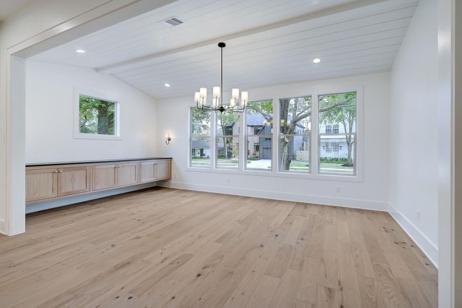 The dining room sits at the front of the home, just off the kitchen, providing a great space for entertaining friends and family. Thoughtful window placement allows natural light to cascade throughout the room while keeping privacy in mind. Built-in floating cabinetry creates a space for storage. *Previous Project*