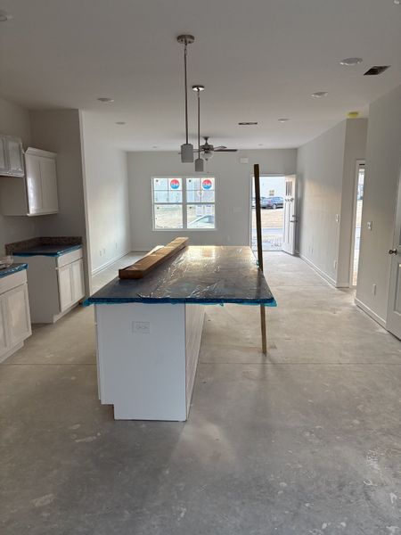 New design to floor plan features large kitchen island!
