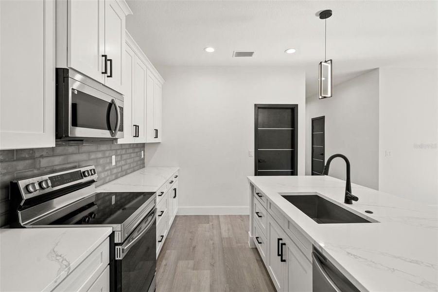 Furnished interior view inside a new home in , Dunnellon (Image 12).
