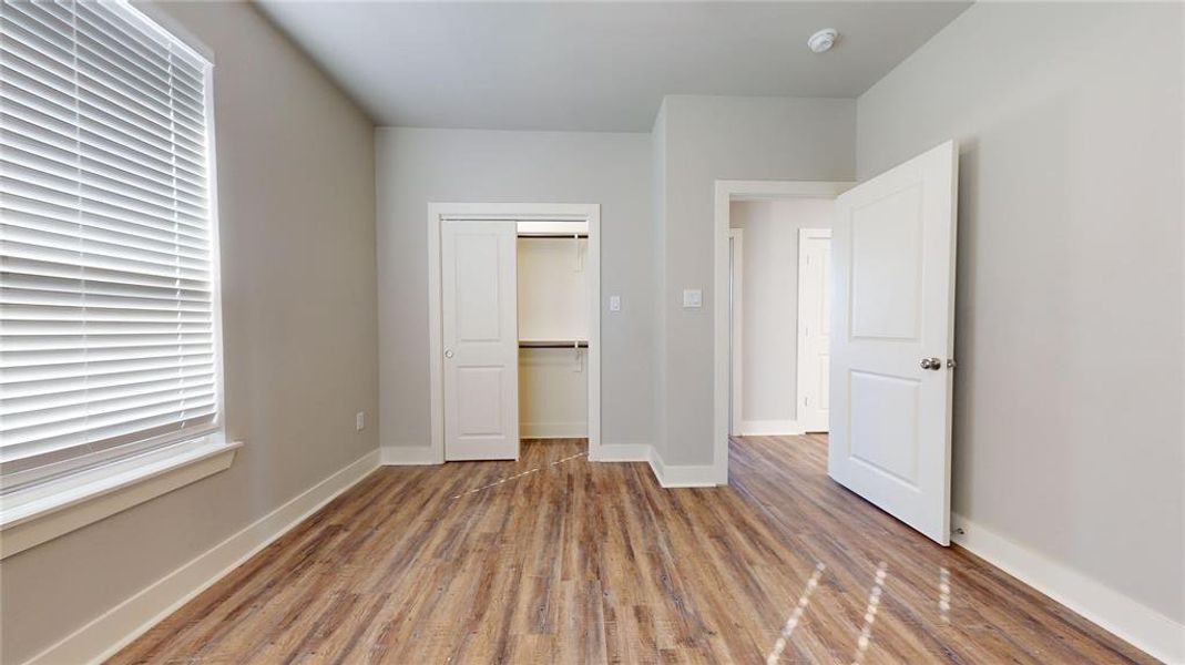 Another secondary bedroom located in the rear of the home.