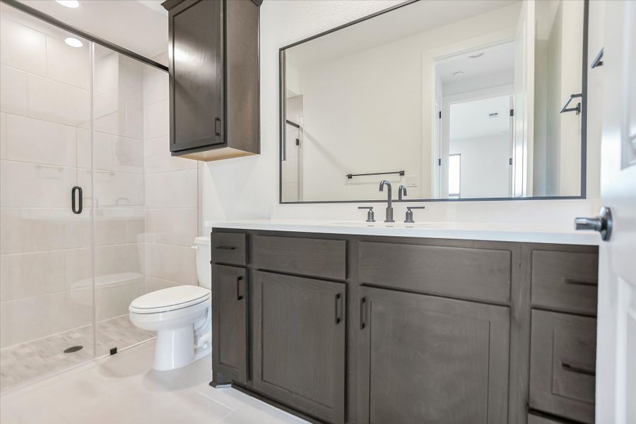 Representative furnished interior of a home built from the Bandera II by Giddens Homes in Whispering Wind, Bertram (Image 73).