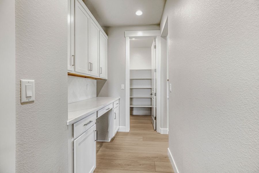Furnished interior view inside a new home in RainDance, Windsor (Image 15).