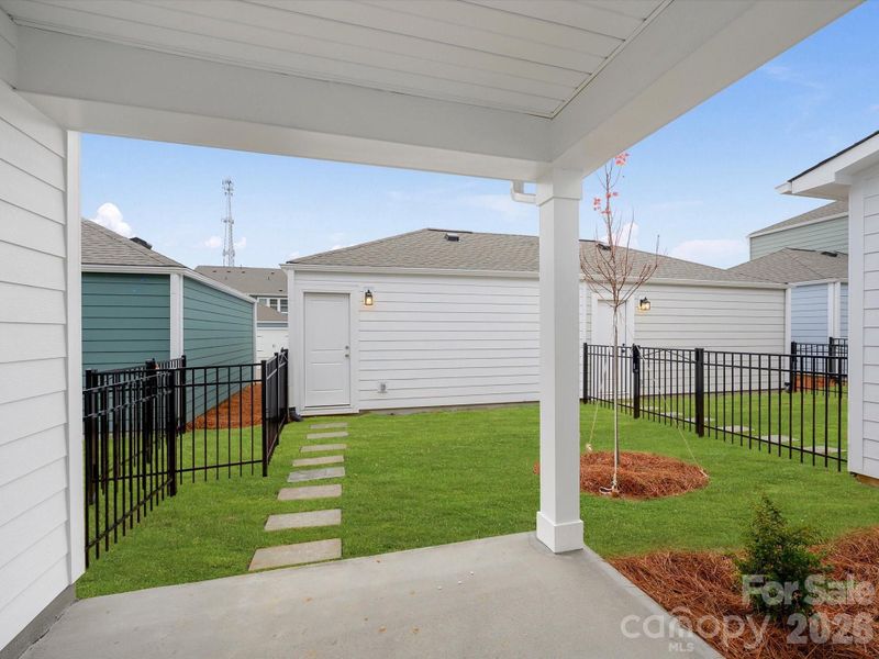 Exterior details and patio area of a home in North Creek Village, Huntersville (Image 20).