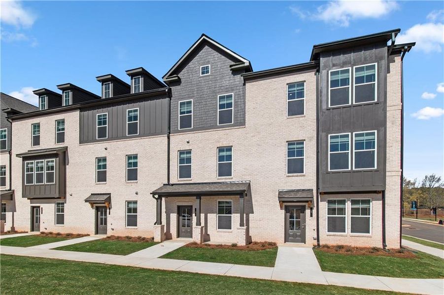Front exterior of a new home in Daybreak, Newnan, GA, highlighting curb appeal (Image 21).