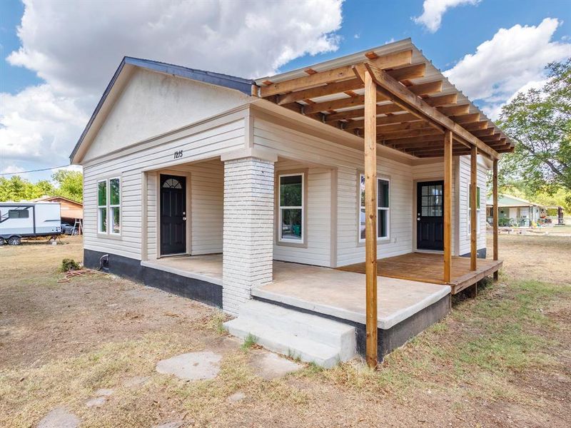 Front exterior of a new home in , Coleman, TX, highlighting curb appeal (Image 12). Front exterior of a new home in , Coleman, TX, highlighting curb appeal (Image 12).