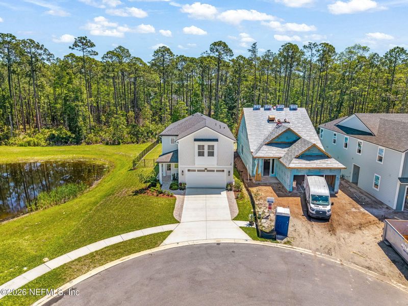 Front exterior of a new home in , Ponte Vedra, FL, highlighting curb appeal (Image 23).