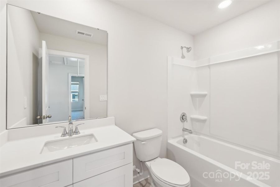 Furnished interior view inside a new home in Walnut Reserve, Conover (Image 7).