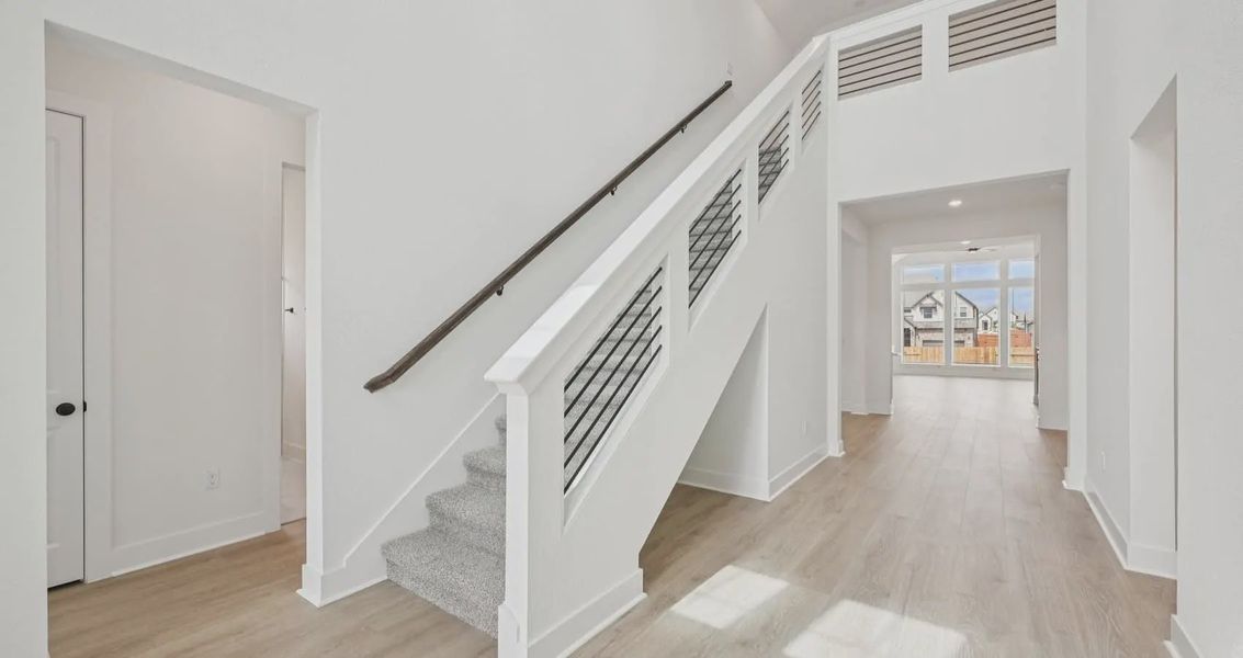 Spacious, unfurnished interior of a new home in Sunfield, Buda (Image 10). Spacious, unfurnished interior of a new home in Sunfield, Buda (Image 10).