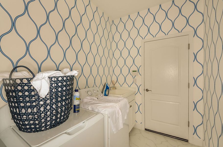 Representative furnished interior of a home built from the Fresh Spring by Neal Communities in Grand Park, Sarasota (Image 17).