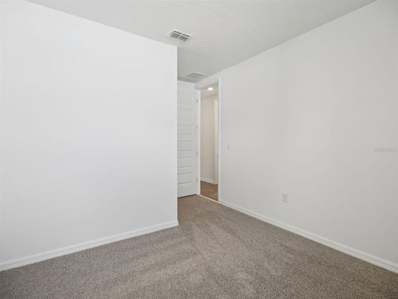 Spacious, unfurnished interior of a new home in Salt Meadows - Signature Series, Parrish (Image 26). Spacious, unfurnished interior of a new home in Salt Meadows - Signature Series, Parrish (Image 26).