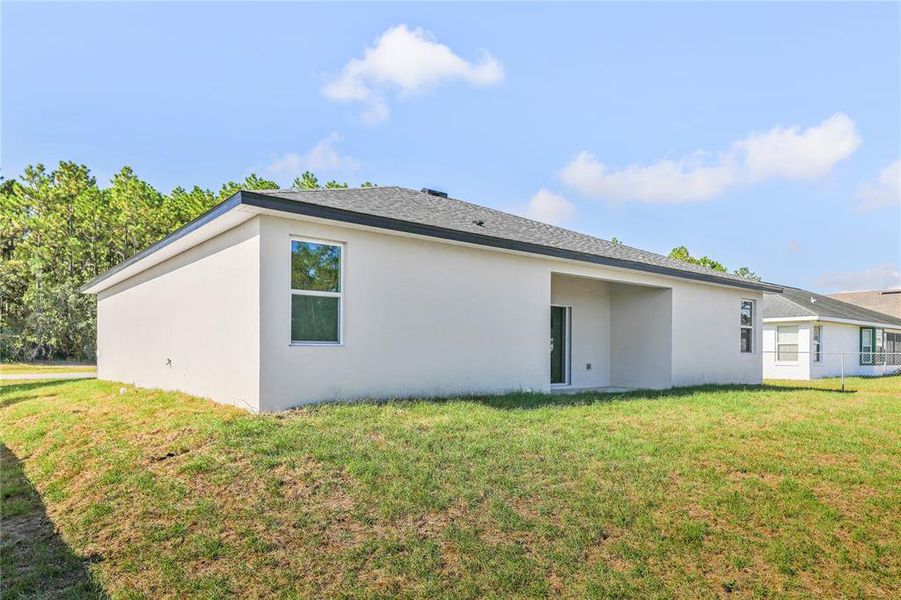 Exterior details and patio area of a home in , Ocala (Image 4). Exterior details and patio area of a home in , Ocala (Image 4).