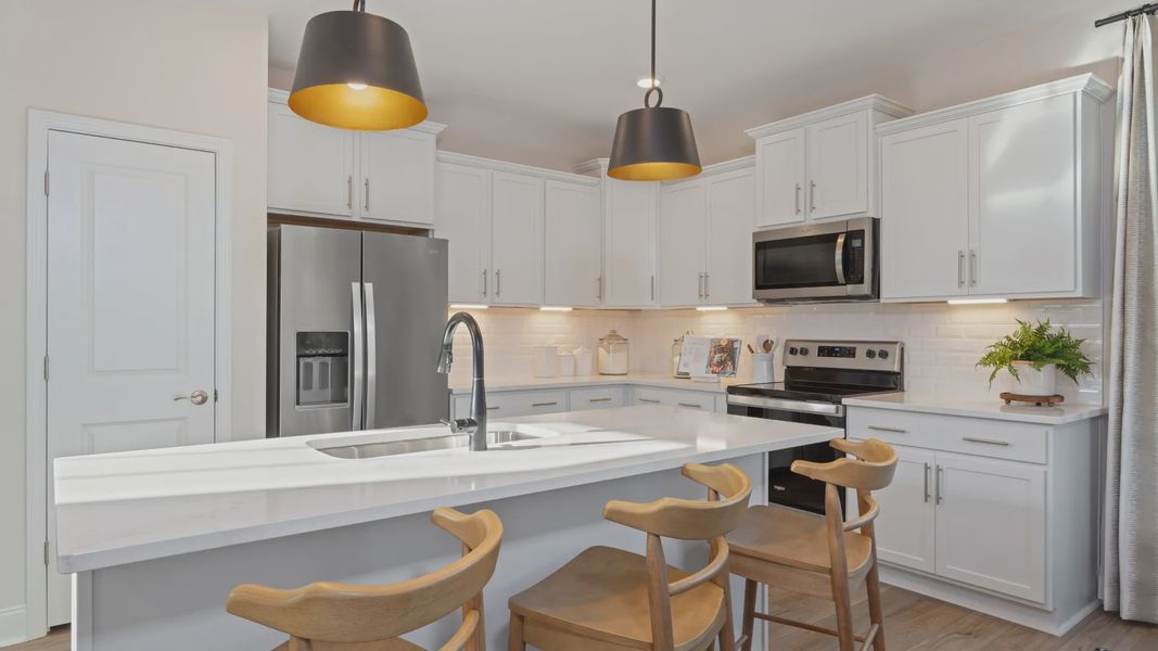 Furnished interior view inside a new home in Station Pointe, Angier (Image 12).