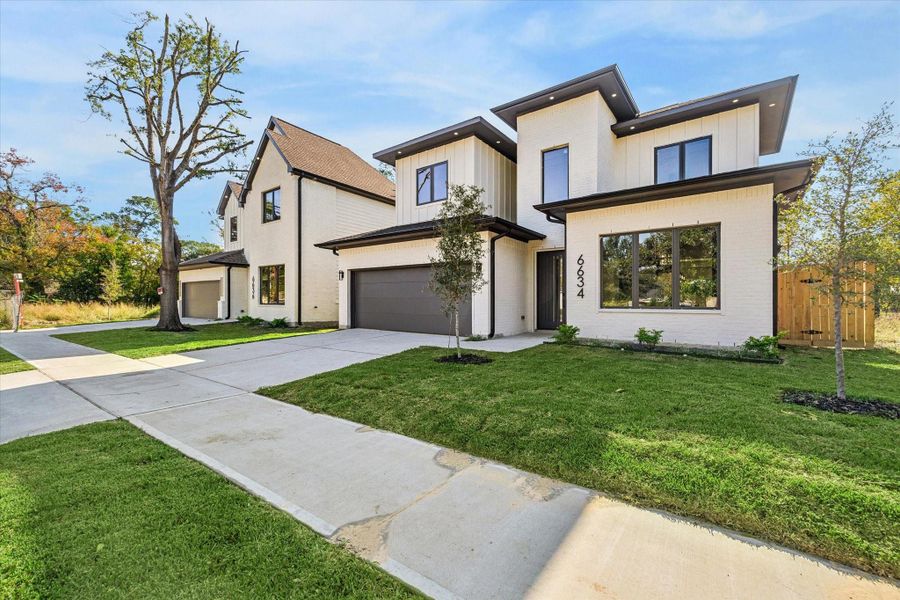 Front exterior of a new home in , Houston, TX, highlighting curb appeal (Image 1). Front exterior of a new home in , Houston, TX, highlighting curb appeal (Image 1).