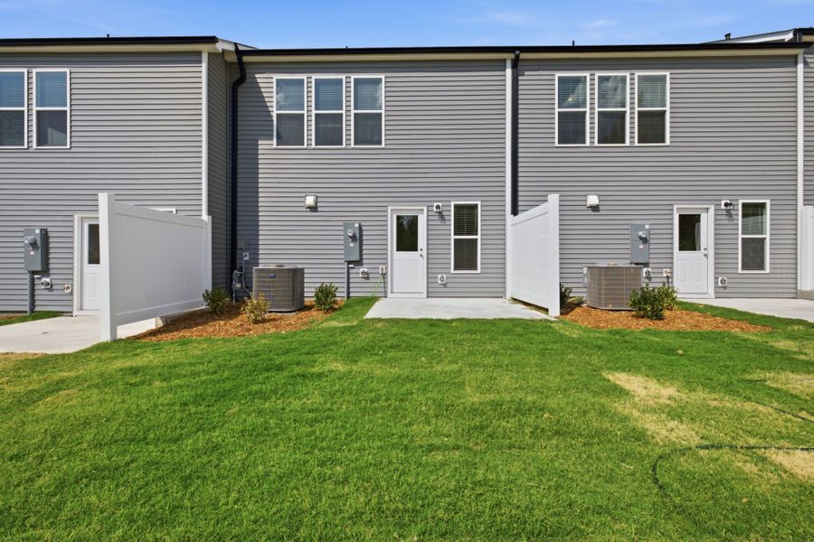 Exterior details and patio area of a home in Carpenter Falls, Durham (Image 3). Exterior details and patio area of a home in Carpenter Falls, Durham (Image 3).