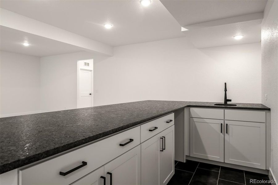Furnished interior view inside a new home in Wolf Ranch - Enclave Collection, Colorado Springs (Image 6).