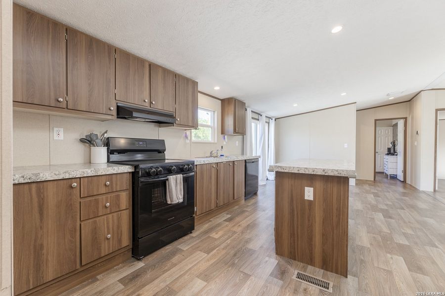 Furnished interior view inside a new home in , Elmendorf (Image 14).