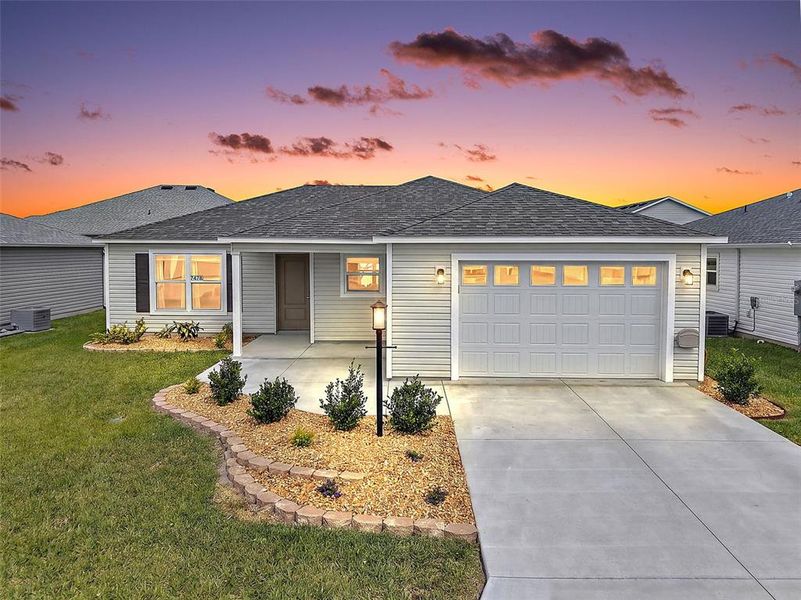 Front exterior of a new home in , The Villages, FL, highlighting curb appeal (Image 21). Front exterior of a new home in , The Villages, FL, highlighting curb appeal (Image 21).